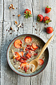 Tiger nut and strawberry soup with coconut and goji berries