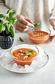 Red nectarine gazpacho with bail and almonds