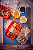 Tupperware with different sandwiches