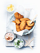 Chicken nuggets with various dips
