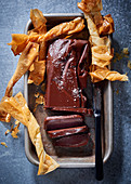 Dark chocolate cake with fleur de sel and filo pastry spirals