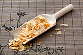 Bonito flakes on a wooden scoop