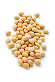 Soya beans on a white surface