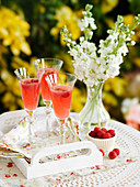 Champagne cocktail with raspberries