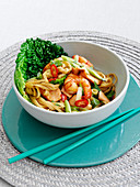 Pasta with salmon, shrimp, ginger and garlic (Asia)
