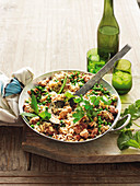 Almond, pea and coriander pilaf with chicken