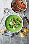 Pea and broad bean soup with crispy bacon
