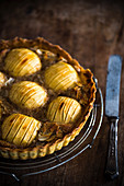 Freshly baked apple and almond tart with a shortcrust pastry base