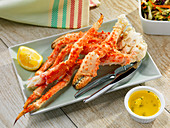Crab legs with butter and lemons