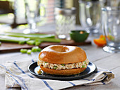 A bagel filled with tuna salad
