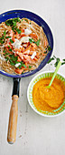 Wholemeal spaghetti with carrot sauce and Gorgonzola