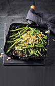 Grilled beans with coconut, spring onions and chillis (Asia)