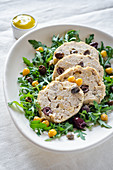 Tuna fish meat loaf with rocket, chickpeas and olives