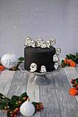 A Halloween cake with royal icing biscuit (red velvet)