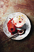 Creamy rice-pudding with rose-poached pears