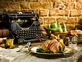Partridge wrapped in bacon with fried pears