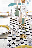 Star-patterned runner on festively set table