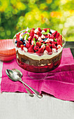 Chocolate trifle with berries, cream and cream cheese