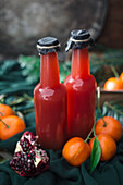 Bottles of mandarin and pomegranate punch