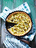 Leek quiche, with a slice removed
