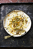 Aeih El Sarayah (Arabian cream dish with pistachio nuts)