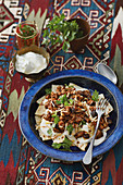 Fatteh Makdos (unleavened bread with an aubergine medley, Syria)