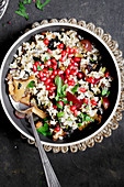 Rice, pomegranate seeds and mushrooms savoury side