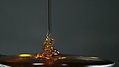 Honey being drizzled, slow motion