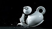 Teapot smashing, slow motion