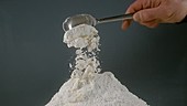 Pile of flour, slow motion