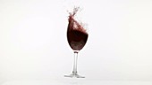 Glass of wine falling, slow motion
