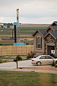 Fracking site near homes, Colorado, USA