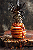 Grilled and battered pineapple slices with liquid nougat
