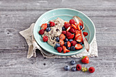 Vegan porridge with almond milk and fresh berries