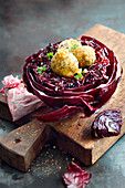 Grilled spicy red cabbage with poppyseed dumplings