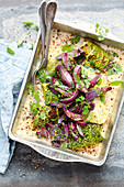 Grilled savoy cabbage salad with onions