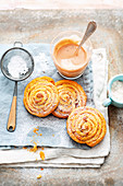 Grilled cinnamon buns with mulled wine sabayon