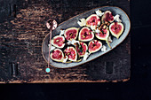 Fresh figs with thyme, honey, toasted seeds and ricotta