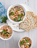 Indian chickpea curry with cauliflower and flatbread