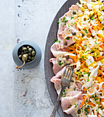 Vitello tonnato with a carrot and chicory salad