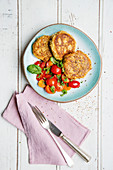 Seeded millet fritters with tomato salad