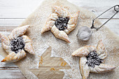 Traditional finnish Christmas stars, made from puff pastry and plum jam