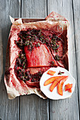 Marinated salmon on a baking tray