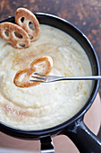 Semolina fondue with mini pretzels
