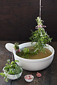 Italian stock fondue with herbs