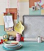A kitchen scene with colourful crockery