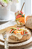 Freshly baked bread with cheese and pickled vegetables