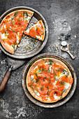 Smoked salmon pizza with sour cream and dill