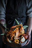 Roast chicken with sage, apple and pear