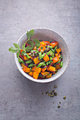Pumpkin and bean salad with dried tomatoes